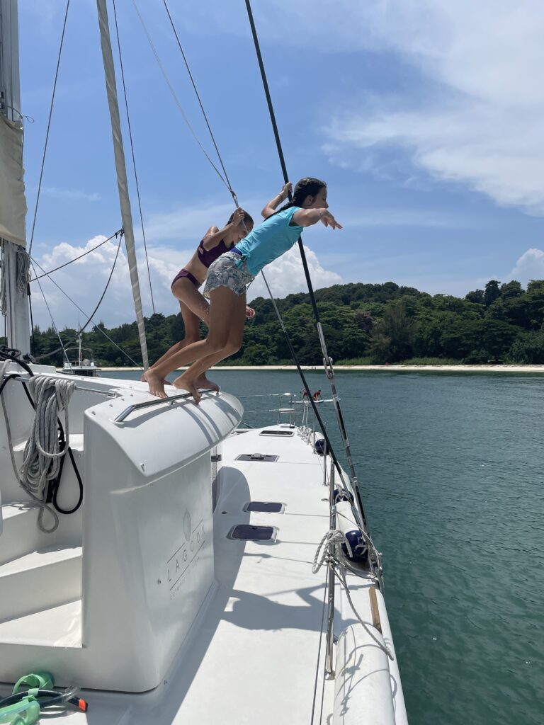 Waga Mari with kids jumping off the yacht